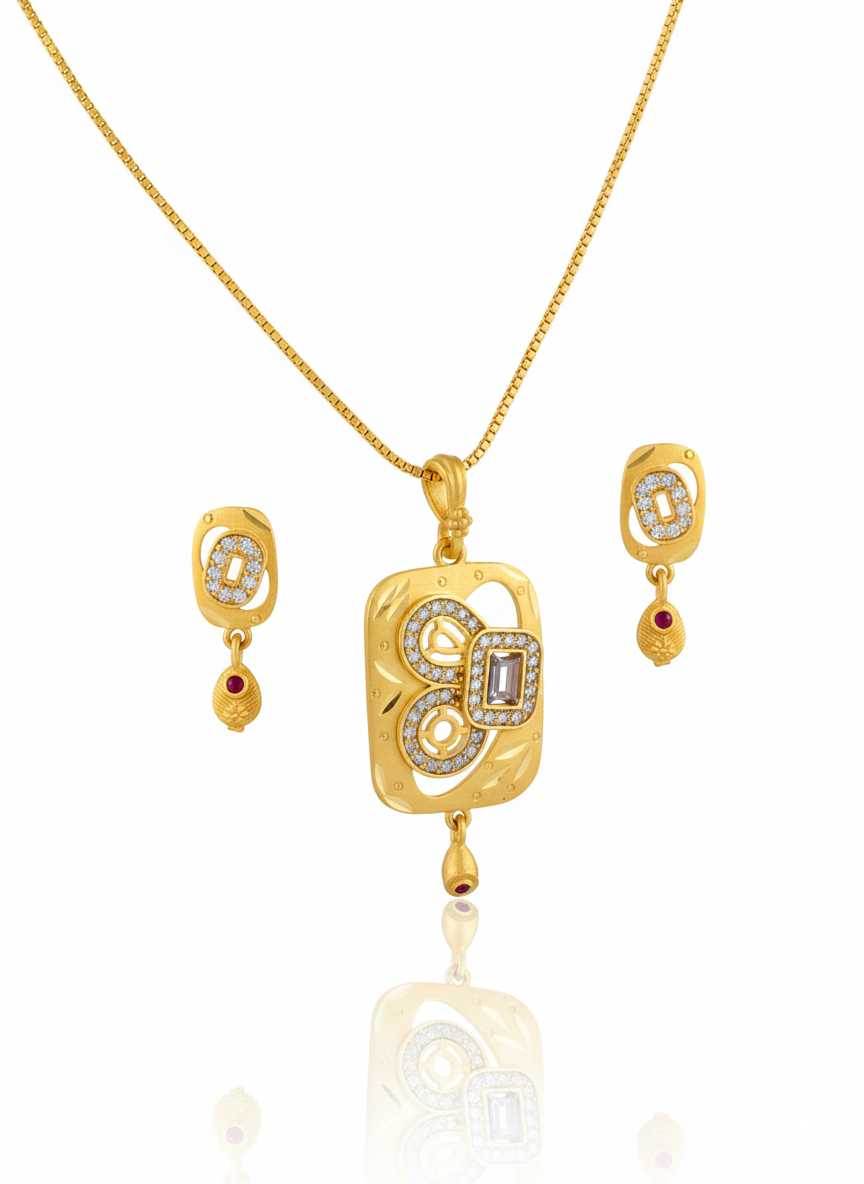 Gold jewelry set with pendant and earrings on a white background