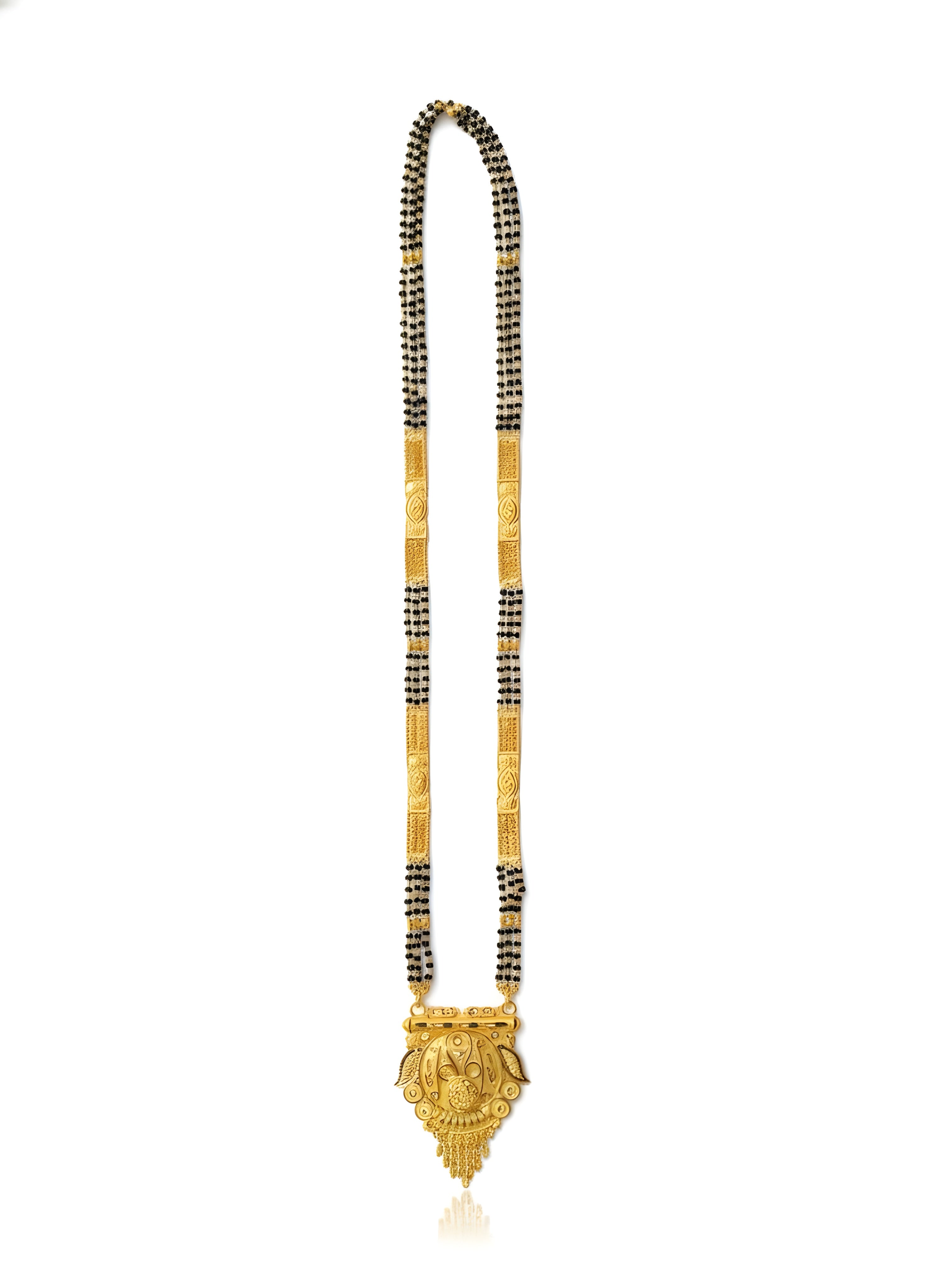Gold and black beaded necklace with a decorative pendant on a white background